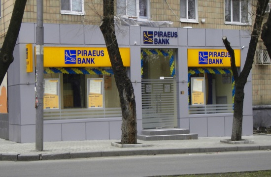 Greek Piraeus Bank turns profitable as Alpha Bank extends losses