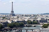 AP: Eiffel Tower reopens in Paris ending 104-day Covid-19 shutdown