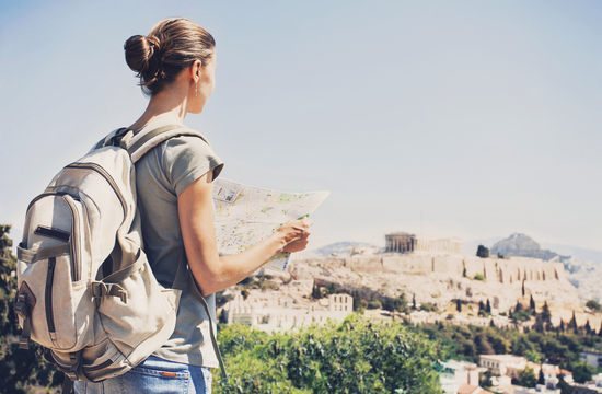 Back,Side,Of,Traveler,Girl,Searching,Right,Direction,On,Map