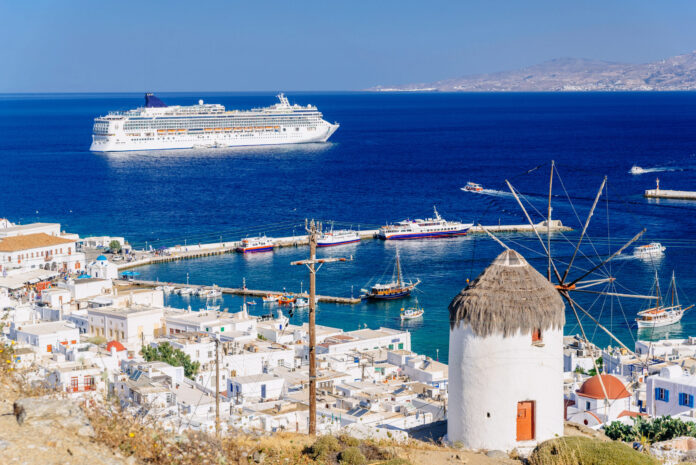 View,Above,Mykonos,Town,With,A,Whitewashed,Windmill,And,A