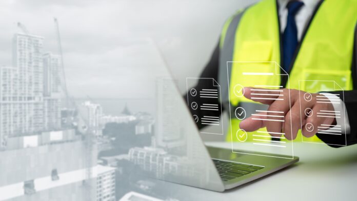 Engineer,Or,Architect,Checking,The,List,Of,Documents,And,Approving